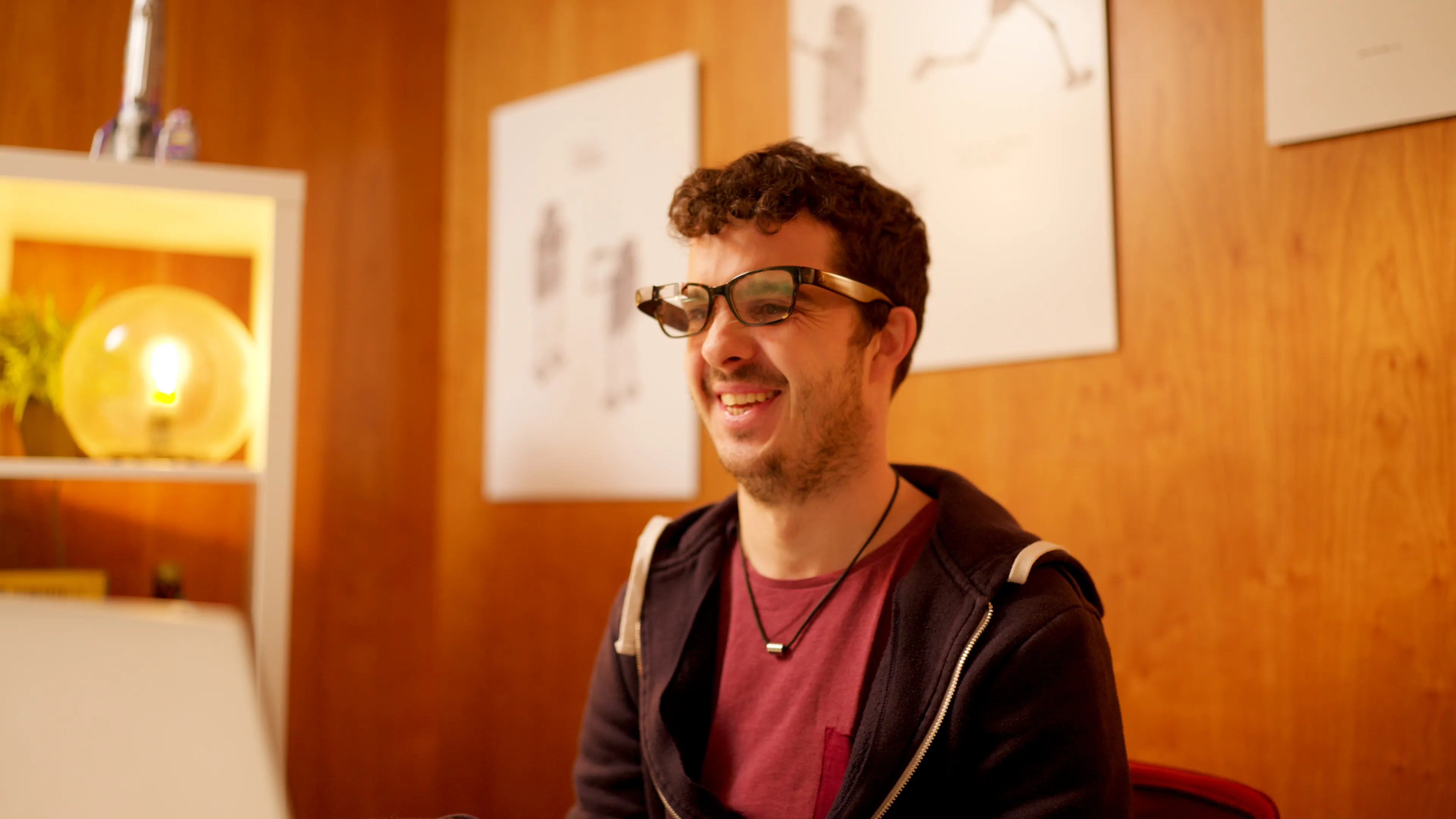 benjamin hofer's at a workspace using the envision glasses